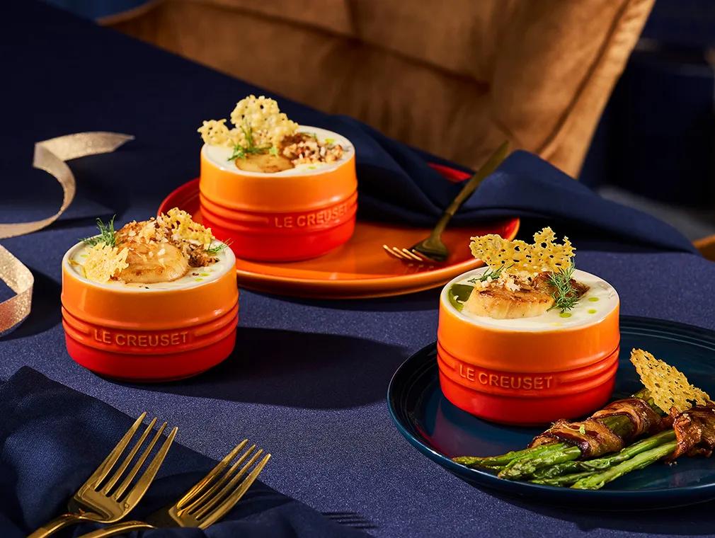 Gegrillte Jakobsmuscheln in cremiger Zitronen-Parmesan-Kräutersauce