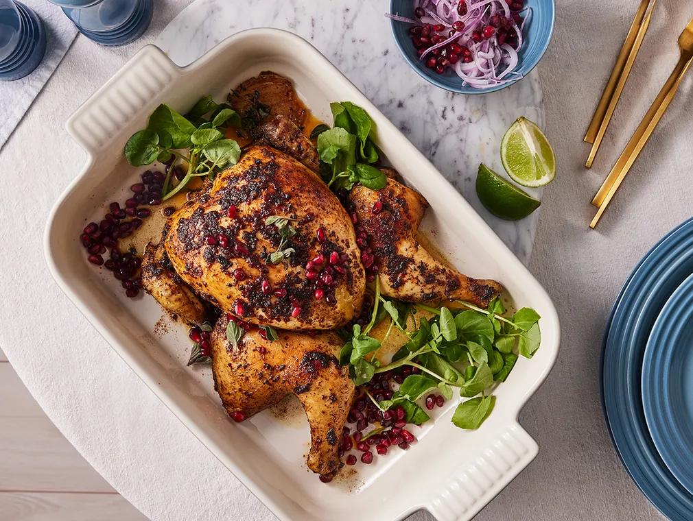 Spatchcock-Brathähnchen mit Harissa und Granatapfel